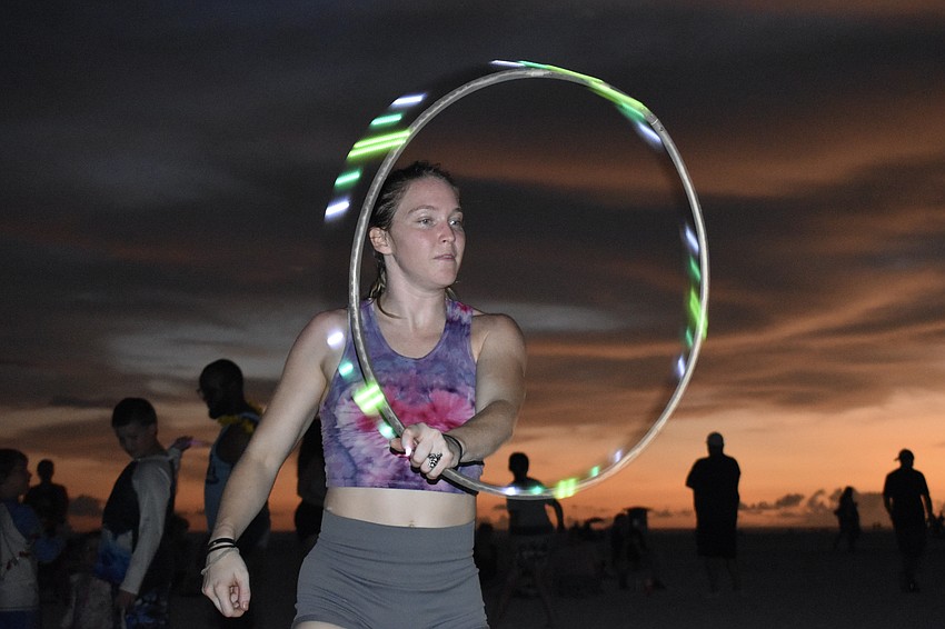 Abbi Young performs with a hula hoop.