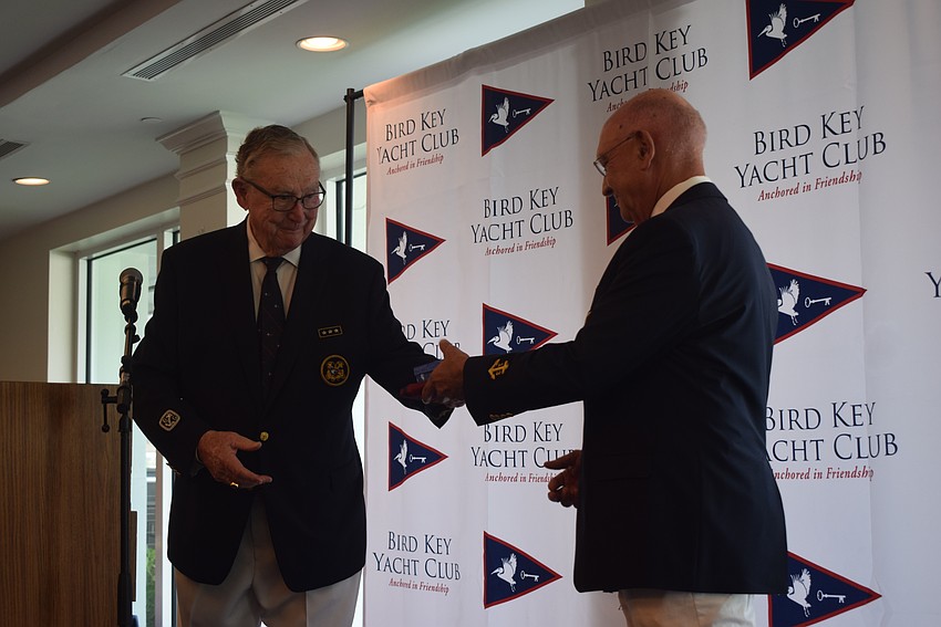 Former Commodore Jim Chadwick swore in Commodore Michael Landis in the passing of the gavel.