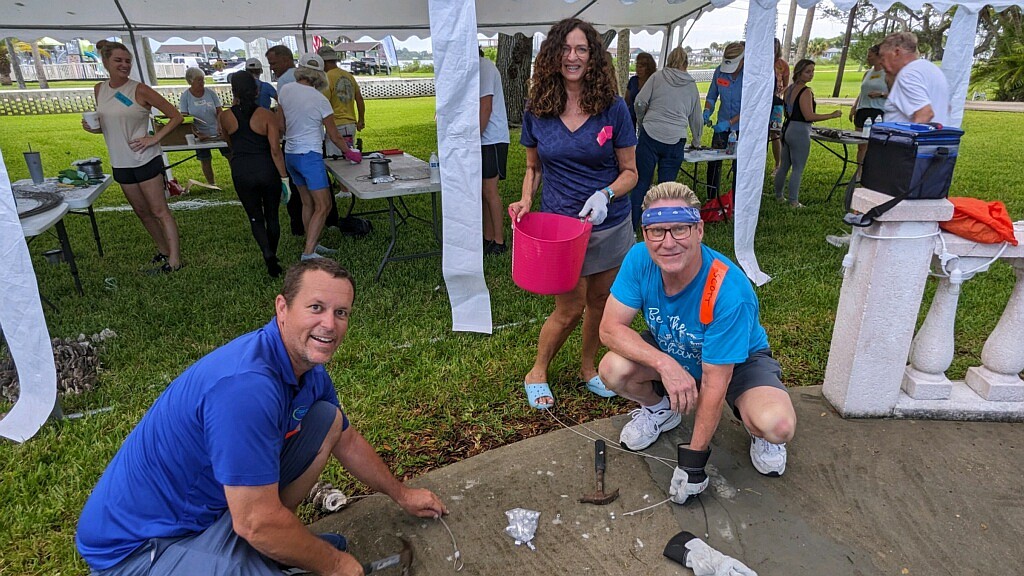 Volunteers Brian Alexander, Carol Murray and Scott Skare help make vertical oyster gardens for Ormond Beach residents during the workday on Saturday, June 22. Courtesy photo