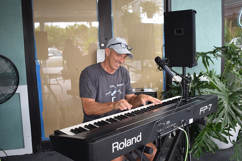 Mike Condensa playing piano for Whitney Plaza.