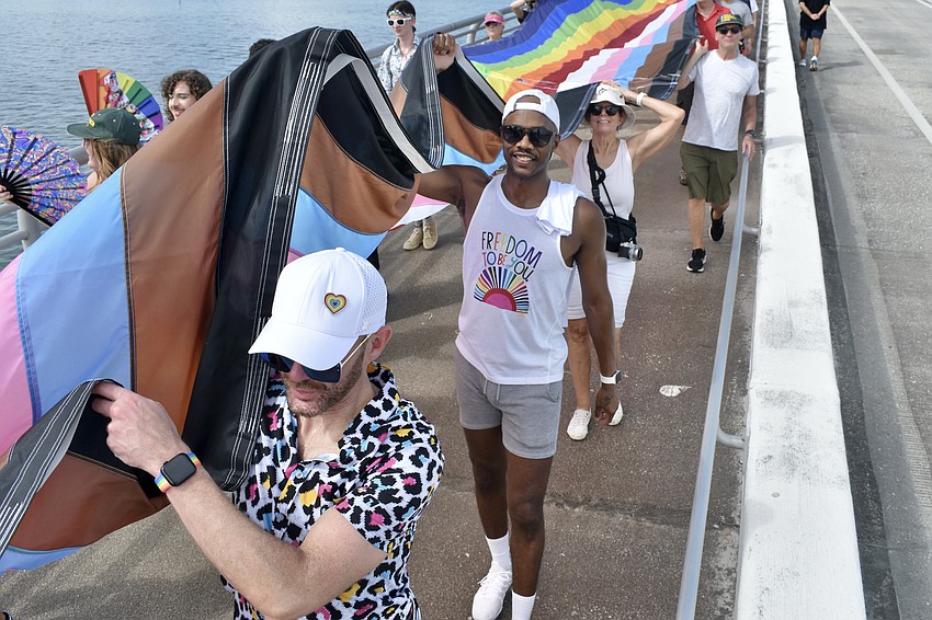 Ryan Mulligan and his partner Donald Matthews make their way across the bridge.