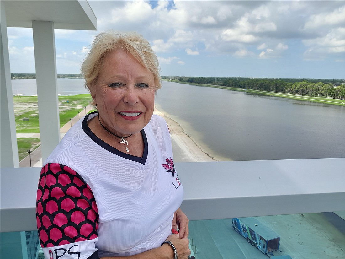 Lakewood Ranch's JoAnn Moore, standing atop the finish tower, is bringing the Unleash Your Dragon event to Nathan Benderson Park in January.