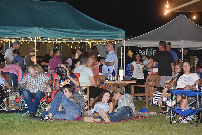Hundreds gather on the lawn for the Red, White and Blueberry Festival at Fiorelli Winery & Vineyard on June 29.