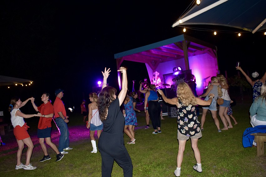 The band, One Night Rodeo, had the crowd dancing to rock and country favorites.