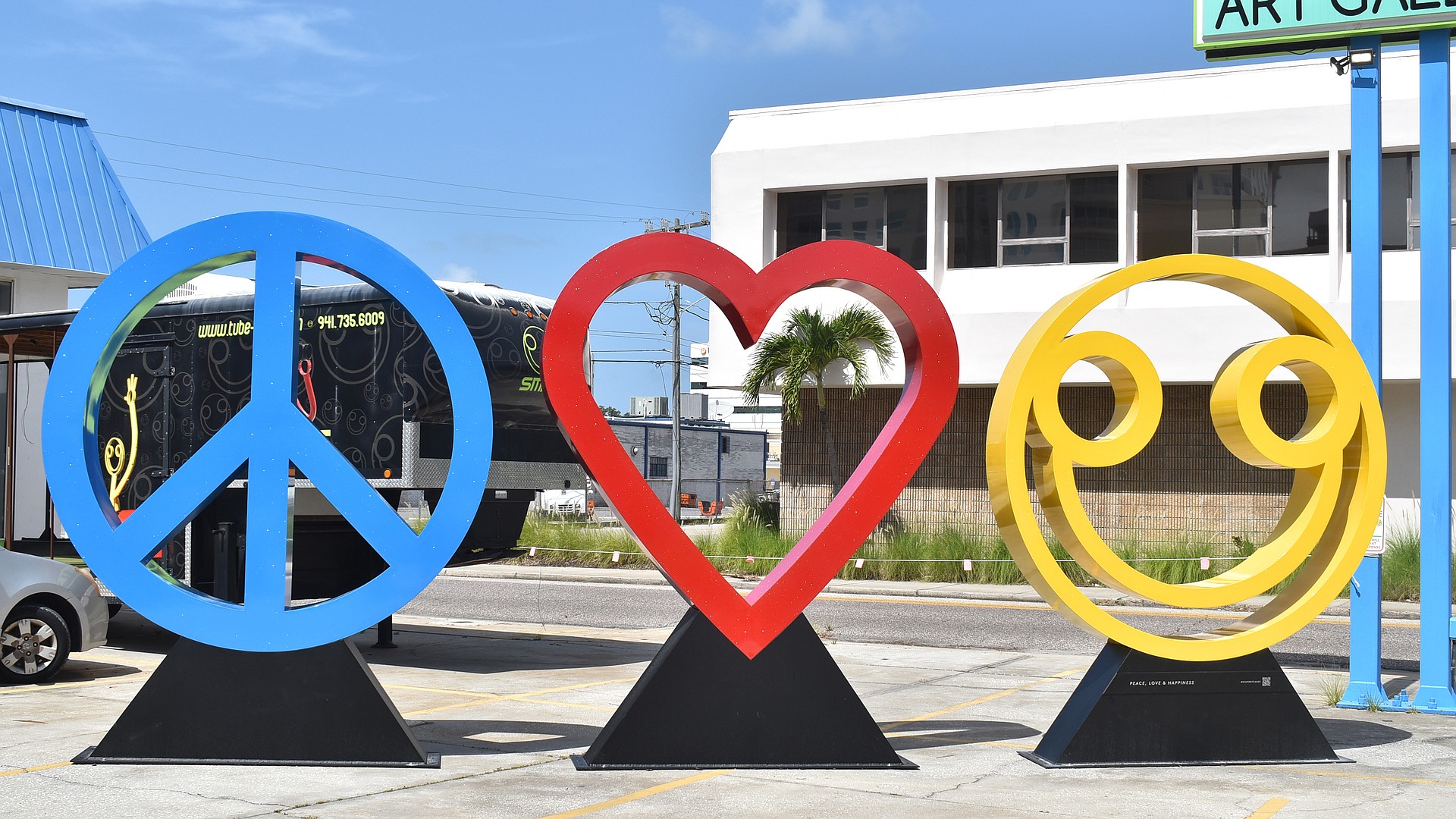 In July 2020, a three-piece Peace, Love and Happiness installation displayed in Tube Dude's parking lot on Main Street ahead of its debut in New York City.