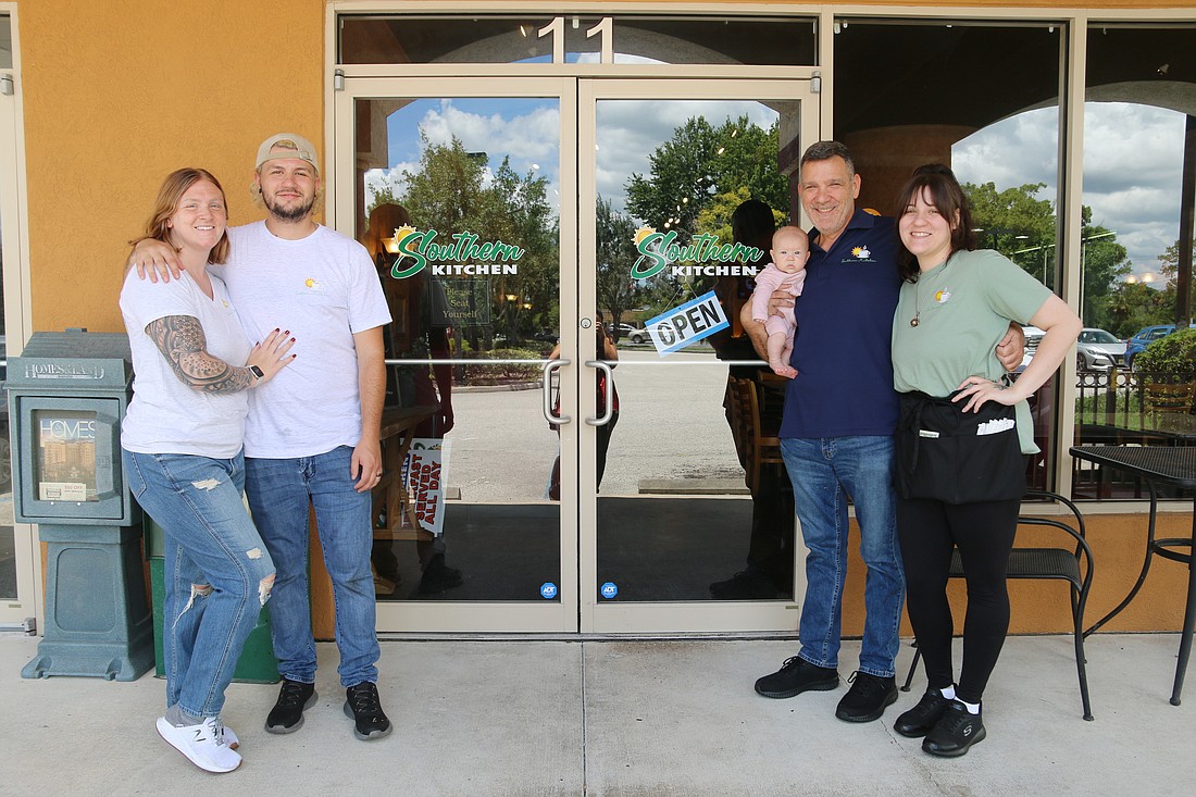 Tom DeCarlo (second from right) owns Southern Kitchen. He is pictured with (from left to right) his daughter-in-law Tori, son Anthony, 3-month-old granddaughter Adrianna and daughter Samantha. Photo by Jarleene Almenas