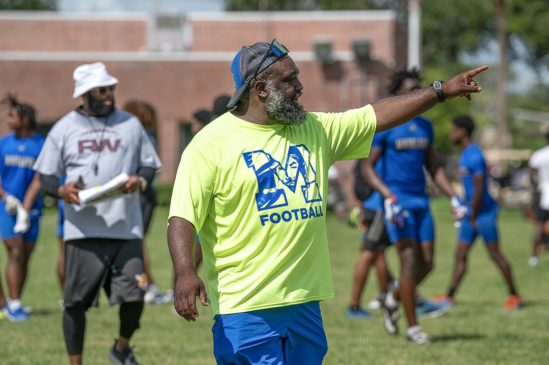 Mainland head coach Jerrime Bell directs his players at a 7-on-7 camp hosted by Bethune-Cookman University earlier this summer. Bell will make his regular-season debut with the Bucs on Aug. 23. File photo by Michele Meyers