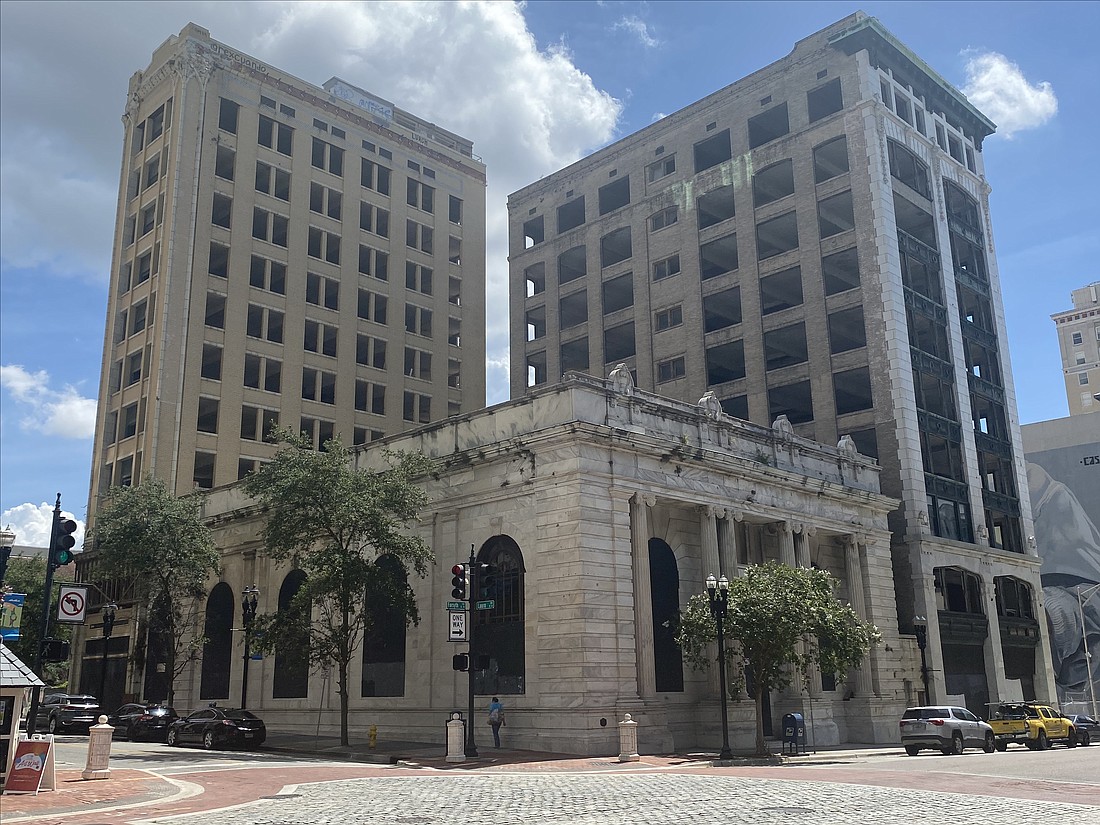 The Laura Street Trio of historic buildings is shown July 3, 2024, from the southwest corner of Laura and Forsyth streets in Downtown Jacksonville. The buildings, which were constructed in the early 1900s, have been vacant and exposed to the elements for more than three decades.