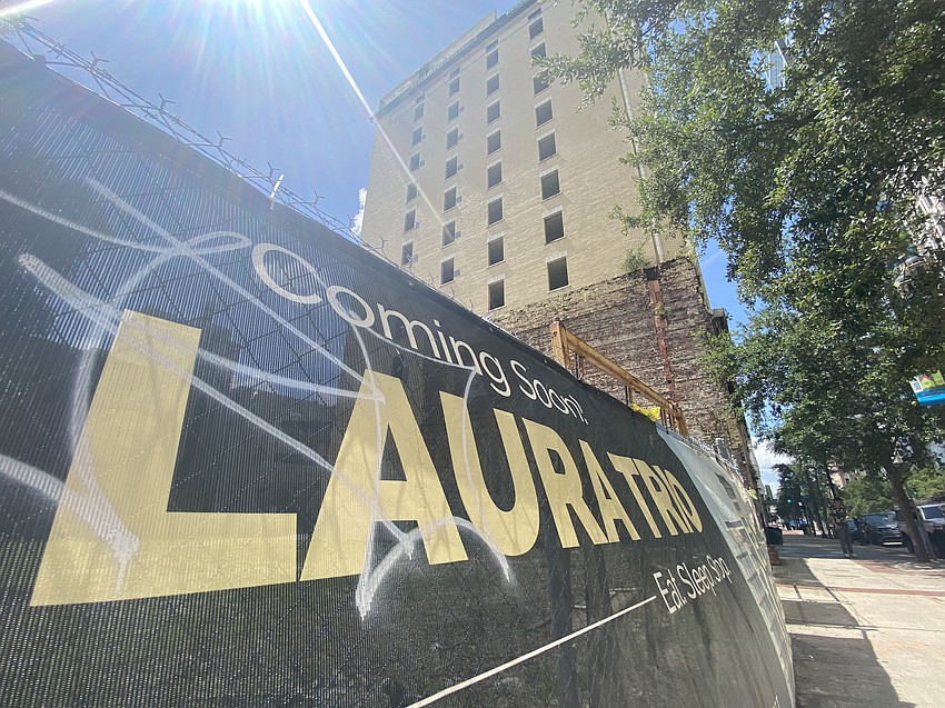 A portion of the Laura Street Trio is shown July 3, 2024, from near Adams and Laura streets in Downtown Jacksonville. The Bisbee Building, at left, and Florida Life Insurance Building combine with the Florida National Bank building at Forsyth and Laura streets to make up the Laura Street Trio. The buildings have been vacant and exposed to the elements for more than 30 years. A portion of the Laura Street Trio is shown July 3, 2024, from near Adams and Laura streets in Downtown Jacksonville. The Bisbee Building, at left, and Florida Life Insurance Building combine with the Florida National Bank building at Forsyth and Laura streets to make up the Laura Street Trio. The buildings have been vacant and exposed to the elements for more than 30 years.