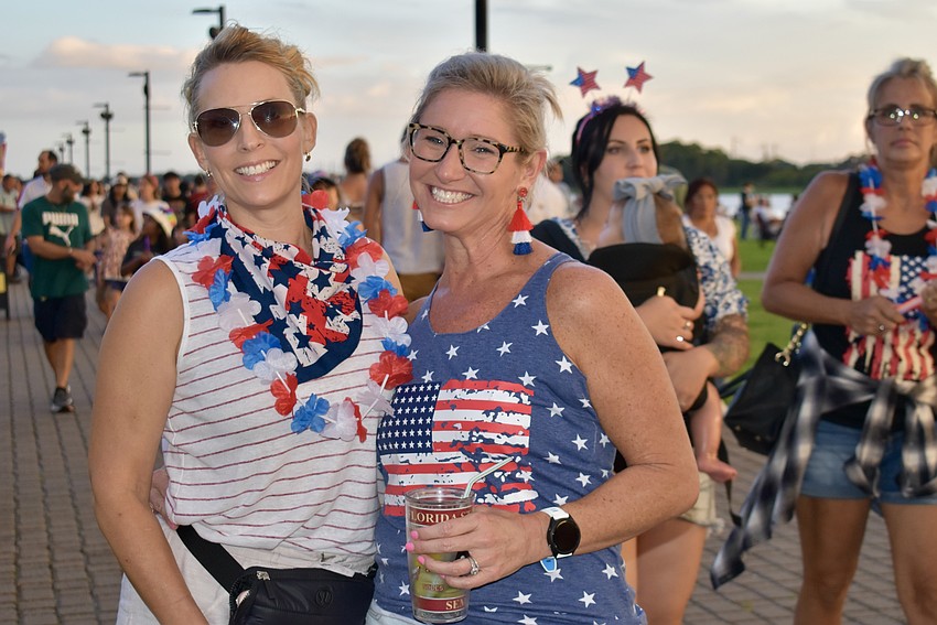 Merica Ange and Hunter Chrisman are neighbors in Summerfield who are enjoying Fireworks on the Lake.
