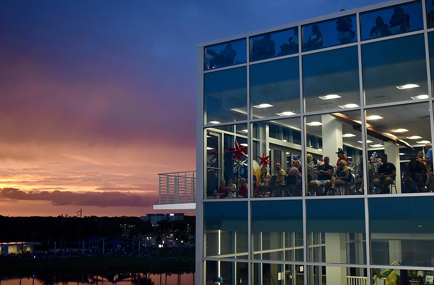 Spectators are in their seats in the finish tower and ready for the fireworks show.