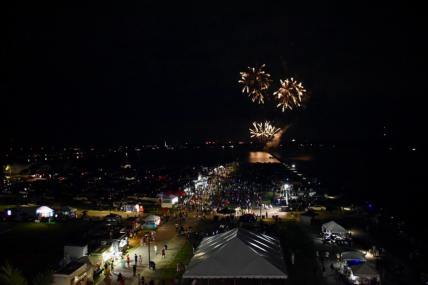 Despite a rainy start, Nathan Benderson Park is packed with thousands of spectators by the end of the night.