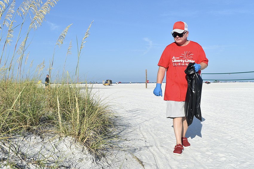 Eric Pugh searches the dunes.