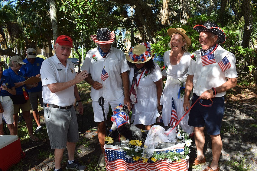 Mayor Ken Schneier officiating the first dog wedding of Longboat Key.