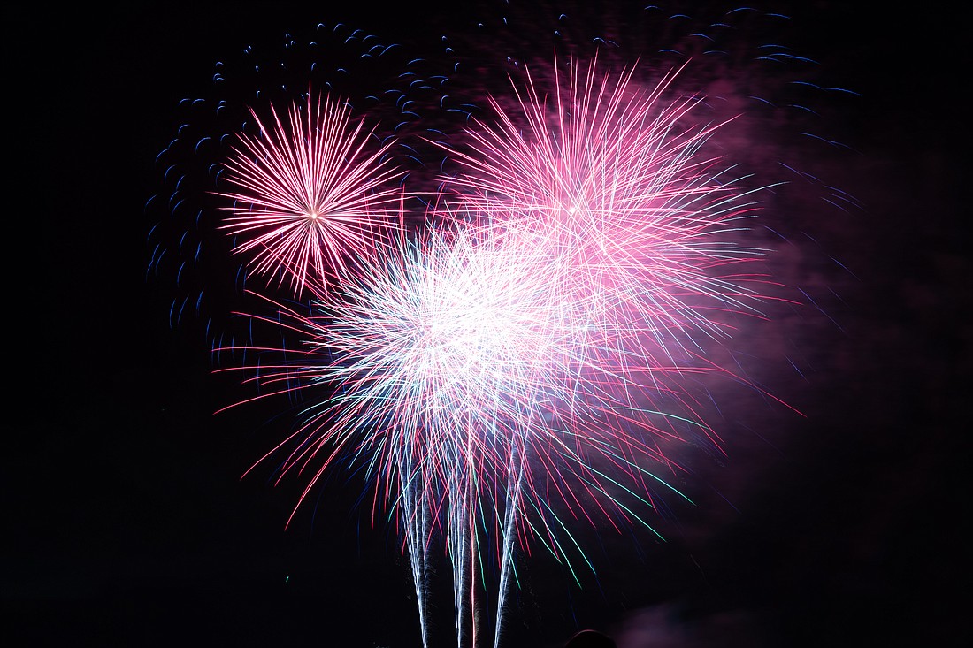 Fireworks light the skies over the Halifax River in Ormond Beach on the Fourth of July. Photo by Suzanne McCarthy