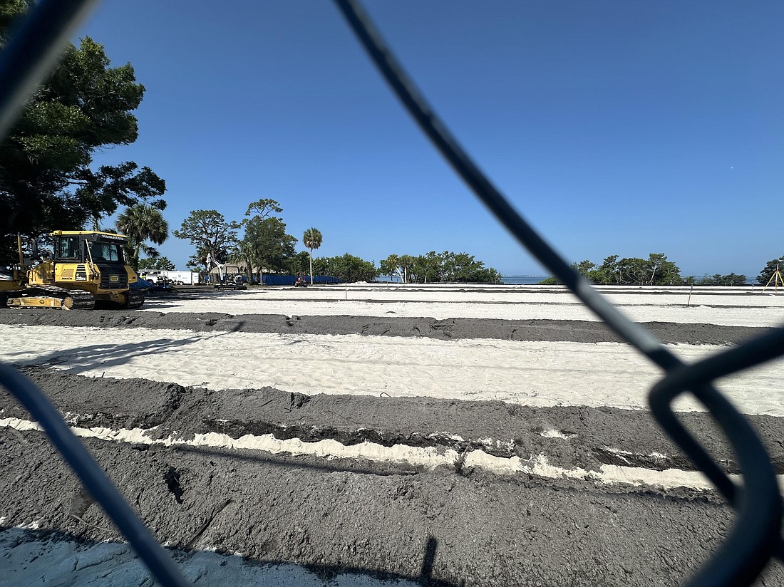 Work by New College of Florida continues on a section of the Uplands Preserve. The area, which had grass and 100-year-old pine tress has been leveled to make way for beach volleyball courts and a soccer field.