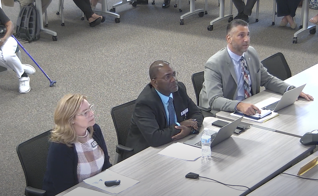 From left to right: Brandy Williams, coordinator of Counseling Services, Marquez Jackson, director of Student Services, and John Fanelli, coordinator of Student Supports and Behavior. Image screenshot from a Flagler School Board livestream