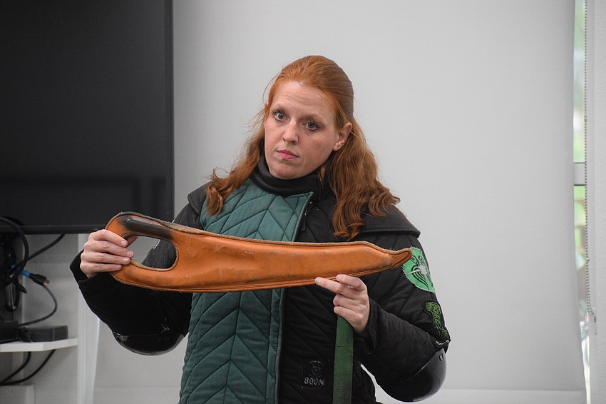 Amanada Closser, the business manager for Steel Ring Academy, explains how the dussack was a weapon used by peasants.