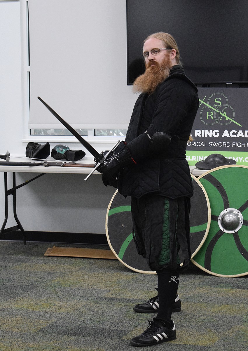 Jason Callis, the founder and owner of Steel Ring Academy, demonstrates the plow guard stance.