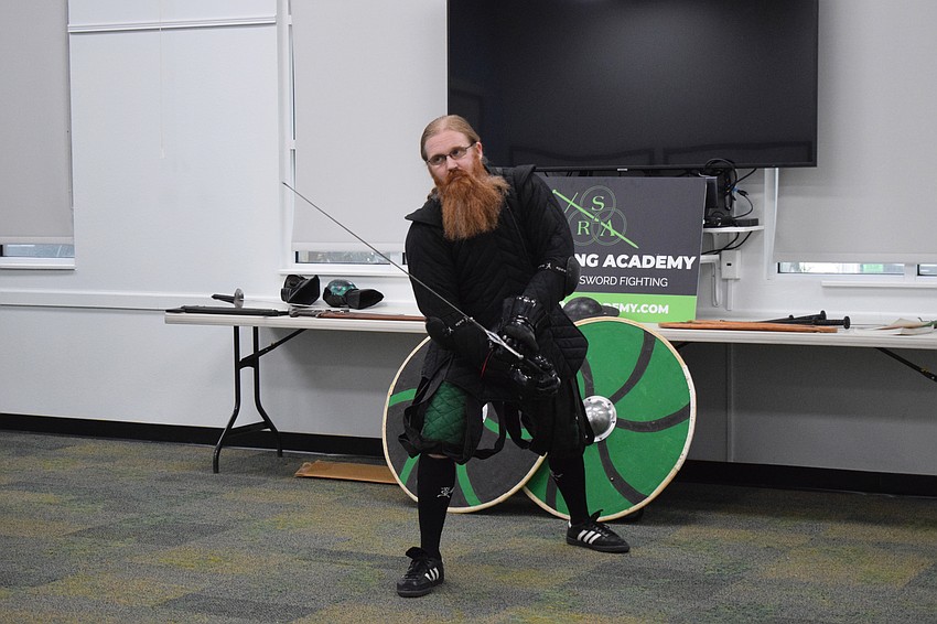 Jason Callis, the founder and owner of Steel Ring Academy, shows the actions he can take after getting into the fool's guard stance.