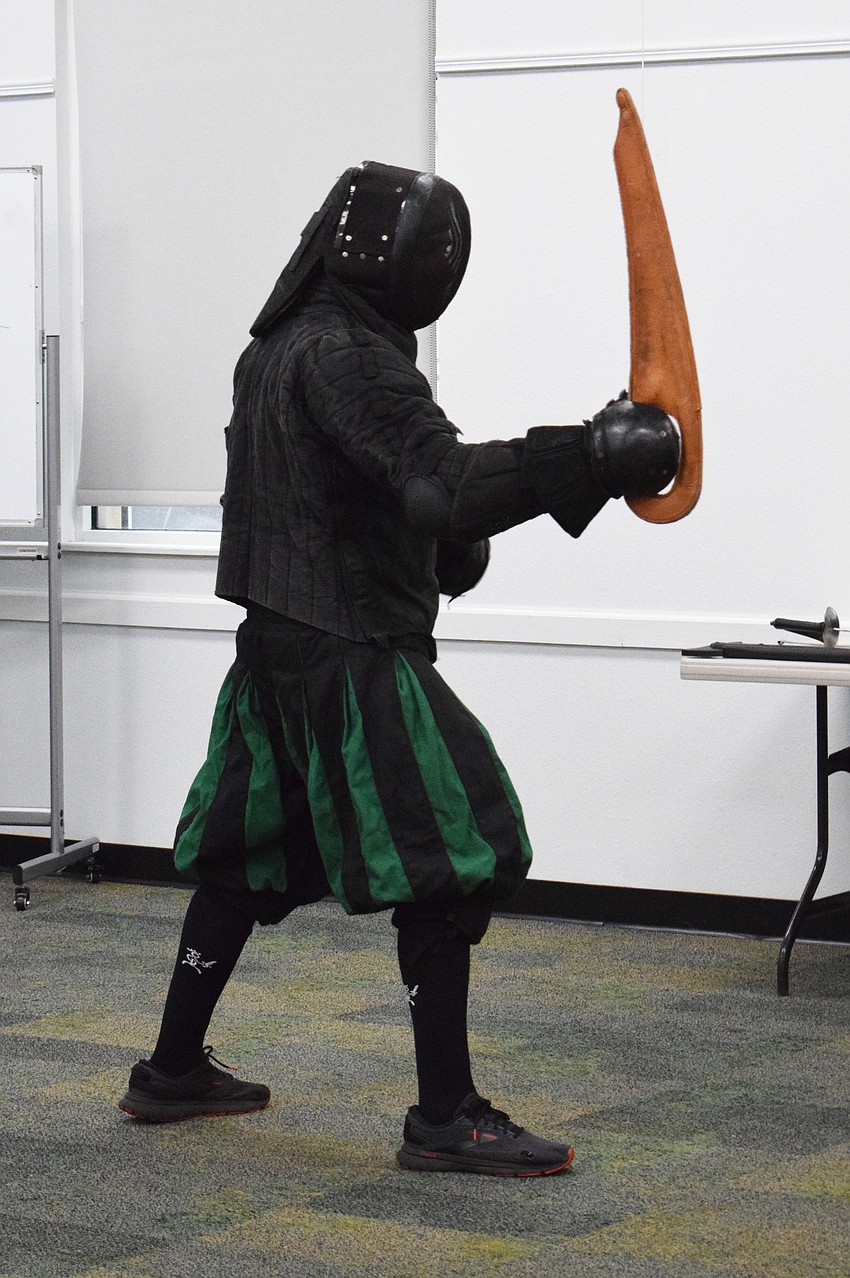 Chris Fontana, a junior instructor with Steel Ring Academy, is in the ready position to start fighting using a dussack.