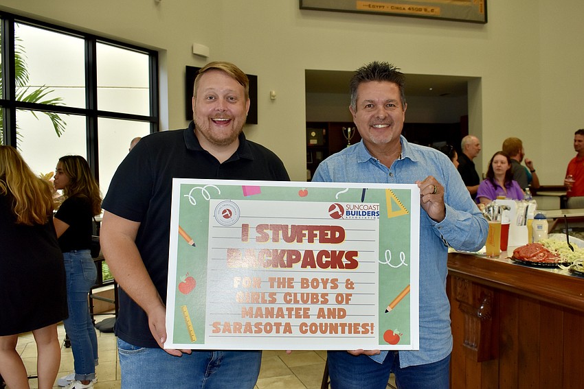 The work is done, so Sarasota resident John Stengel and Lakewood Ranch resident Drew Smith enjoy the after-party.