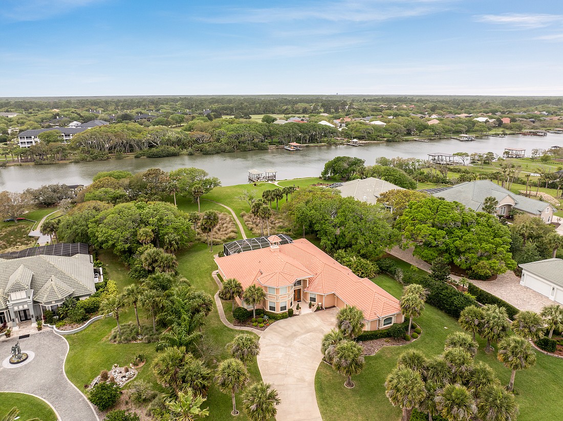 The house is a 4/3.5 and has one fireplace, a pool with heated spa, access to the Intracoastal Waterway and 4,189 square feet. Photo courtesy of Kate Kimberley-Gable/One Sotheby's International Realty