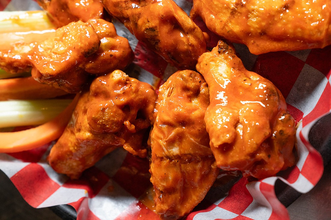 At Wolves Head Pizza & Wings order 5 wings ($8.99) to 20 wings ($29.99).