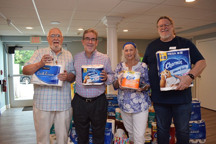 Gene Tischer, Gary Scott, Sandra Johnson and the Rev. Jeffrey Nunes
