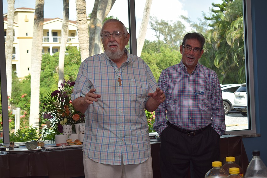 Gene Tischer and Gary Scott talk to Longboat Island Chapel.