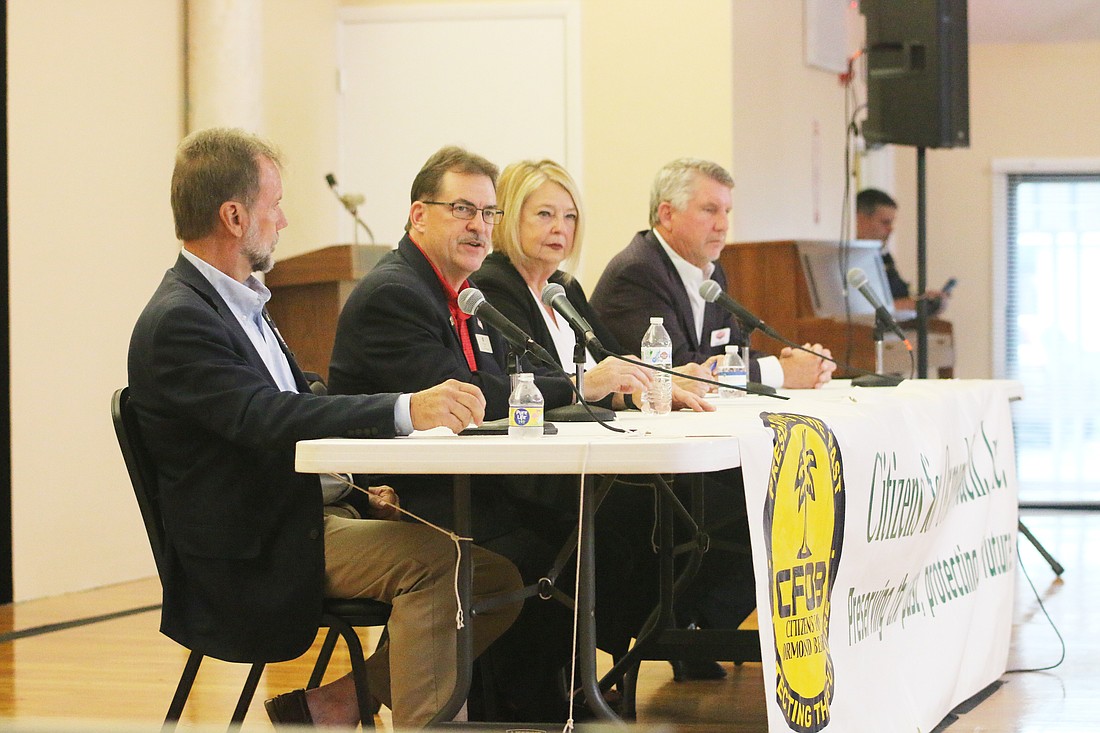 The candidates for the Volusia County Council Chair seat — Jeff Brower, Don Burnette, Deb Denys and Randy Dye — participate in the Citizens For Ormond Beach forum on Wednesday, July 17. Photo by Jarleene Almenas