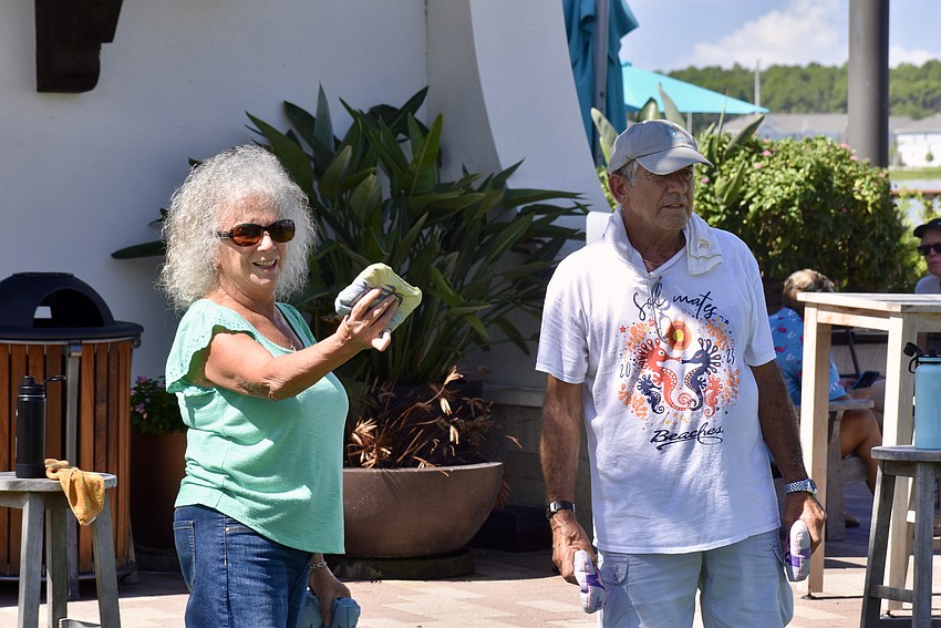 Adriana Gretch and Rich DeStasio play cornhole in The Yard at Waterside Place every week from 10 to 11 a.m.