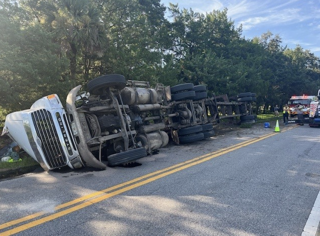 A logging truck trolled over on County Road 305. Photo courtesy of the FCSO