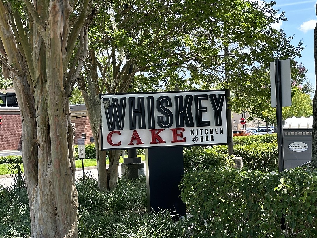 The sign for Whiskey Cake Kitchen & Bar is up in Town Center.