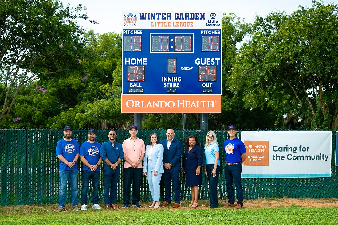 Orlando Health, city of Winter Garden and Winter Garden Little League representatives helped to celebrate the new digital scoreboards.