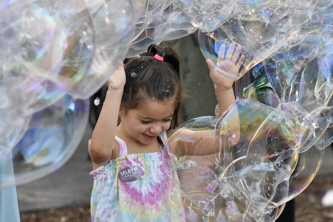 Alexia Swayka, 4, gets into the center of the action.