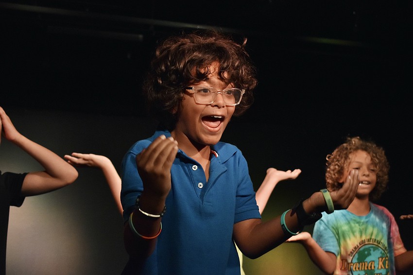 Giovanni Theiner, 9, performs an opening recitation.