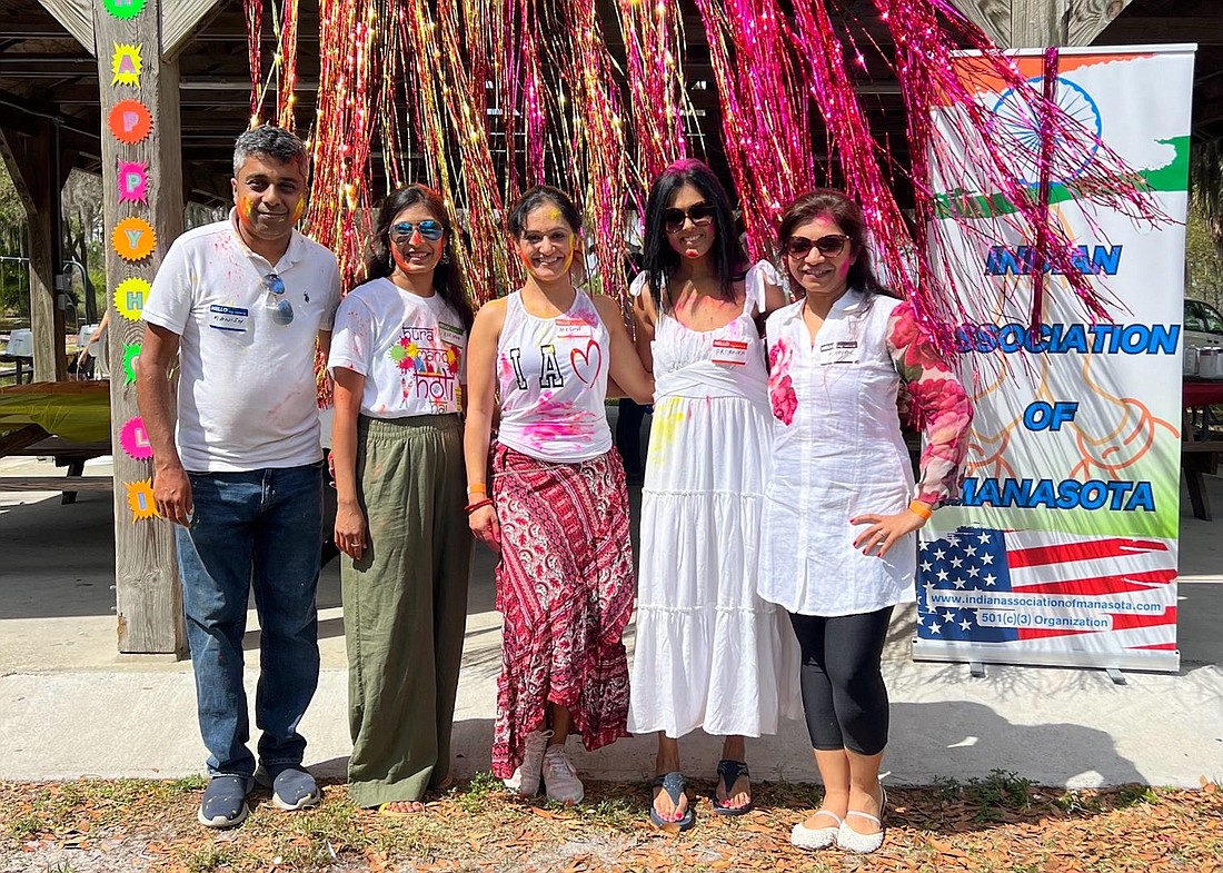 The Indian Association of Manasota leadership team Manish Agrawal, Rachana Sanghvi, Megha Vaid, Priyanka Gupta amd Kanal Badiyani celebrates Holi.