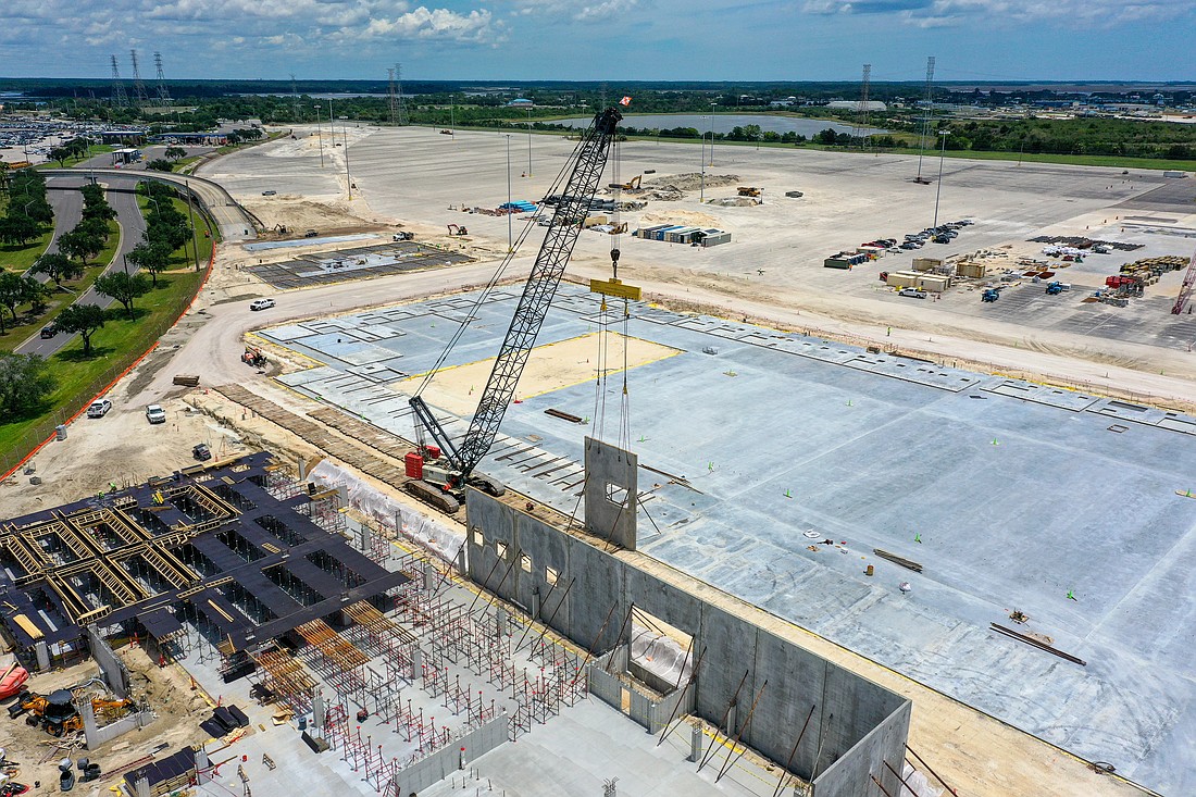 Vertical construction is underway at the Southeast Toyota Distributors auto processing center at the Jacksonville Port Authority’s Blount Island Marine Terminal.