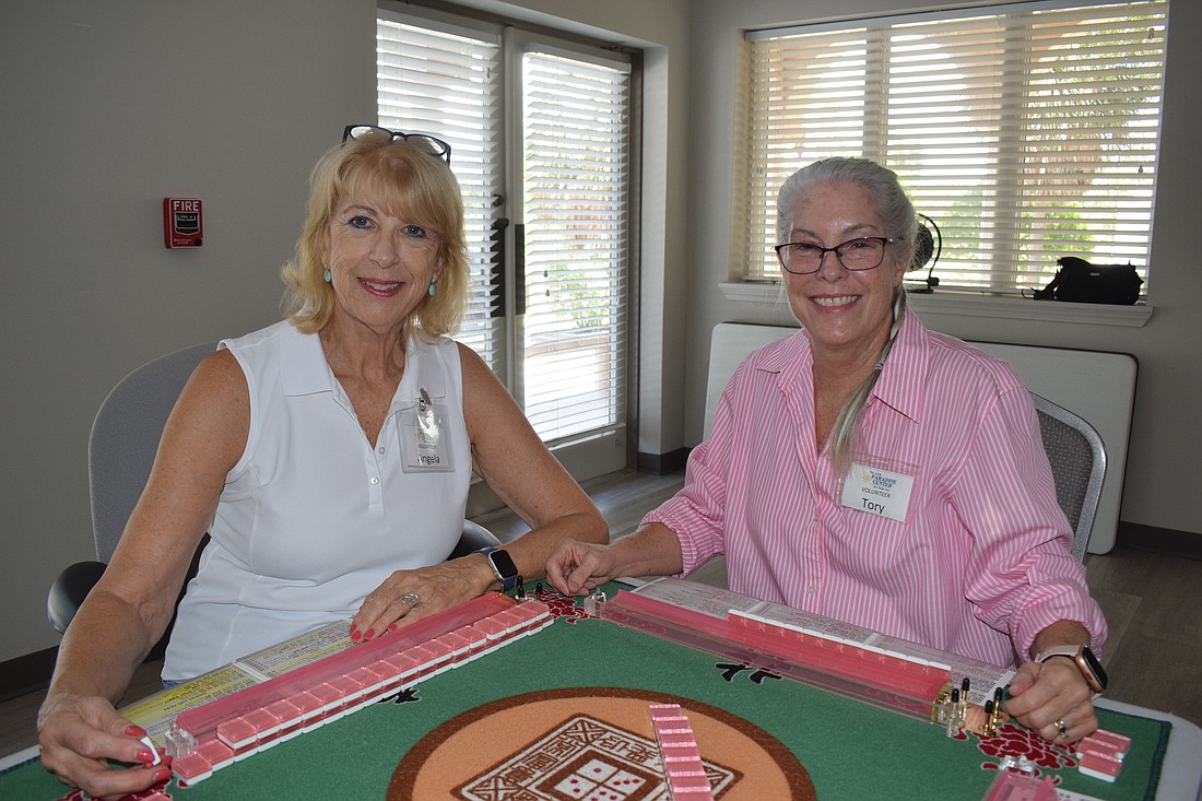 Angela Bennink and Tory Newman at the mahjong table