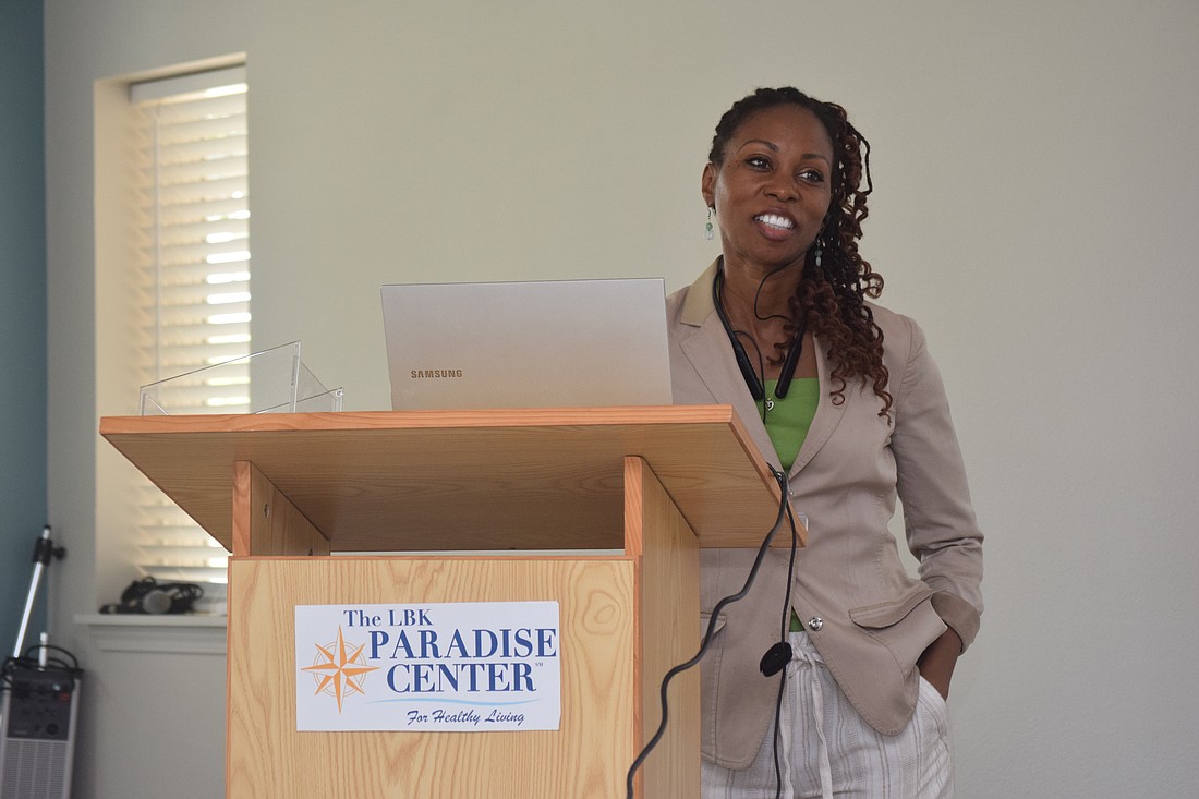 Dr. Coeurlida Ashby speaks at the Paradise Center.