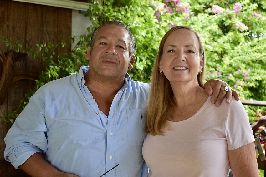 East County residents Gus Teixeira and Amy Yount attend Christmas in July at the Sarasota Parrot Conservatory. Yount is the CEO of Step Up Suncoast.