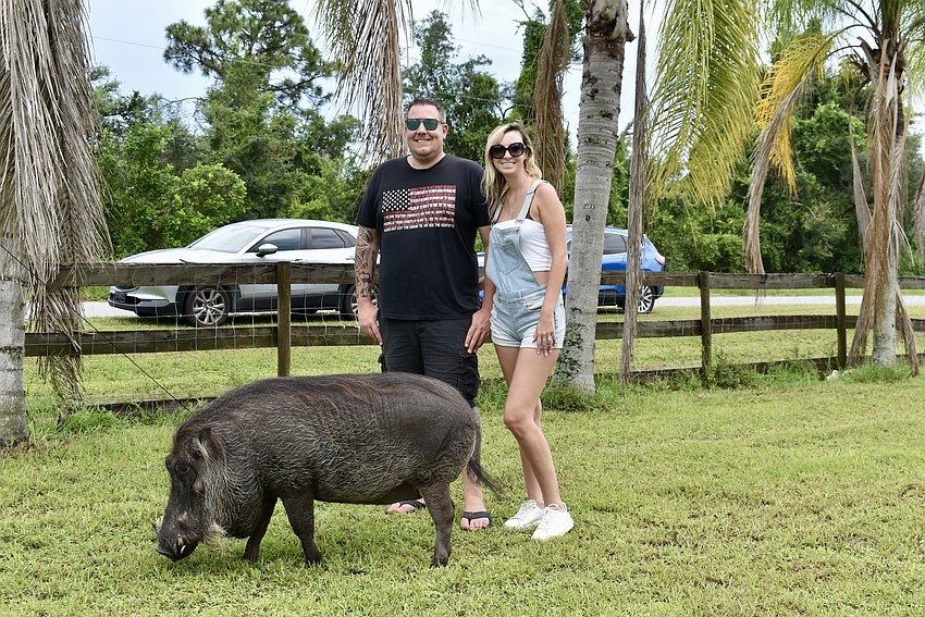 Palmetto residents Scott and Ariana Trainor first met Wallace the Warthog at an event at Bethany Baptist Church.