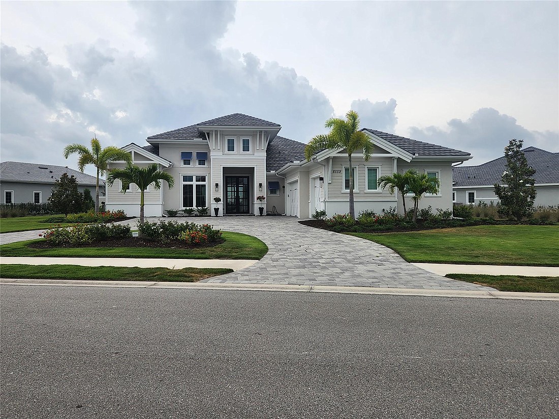 This Lake Club home at 8559 Pavia Way sold for $3.8 million. It has five bedrooms, five-and-a-half baths, a pool and 4,162 square feet of living area.