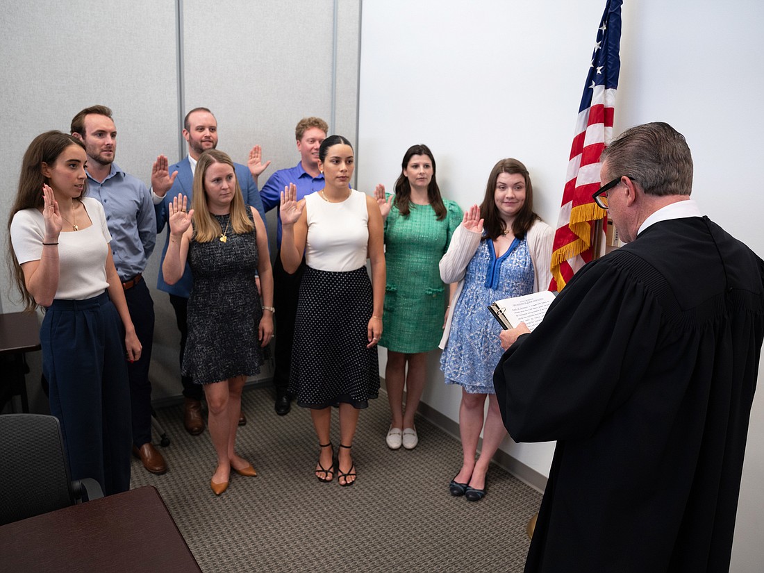 Jacksonville Bar Association Young Lawyers Section board members, from left, Julianna Favale, Bryce McColskey, Camille Sheppard, Austin Sherman, Daniel O’Byrne, Susan Cavailhon, Alexandra Underkofler and Sydney Schmidt were sworn in July 19 for the 2024-25 Bar year by 4th Circuit Chief Judge Lance Day. Not pictured: board members Paige Cham, Alina Fernandez, David Chauncey, Adam Prom and Matt Borello.