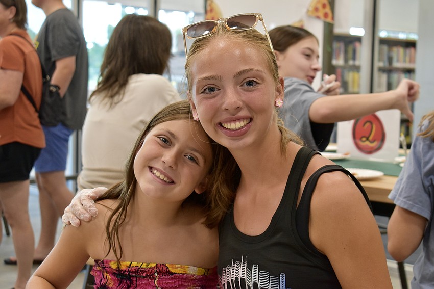 Lakewood Ranch resident 9-year-old Audrey Weldon choosesFresh Market. Her 16-year-old sister Gianna Weldon chooses Michelangelo's.