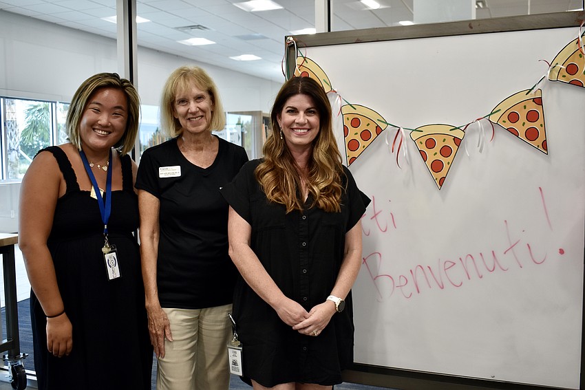 Assistant Branch Supervisor Callie Hutchison, Friends President Sue Ann Miller and Teen Librarian Sabrina Hornyak oversee the taste-off.