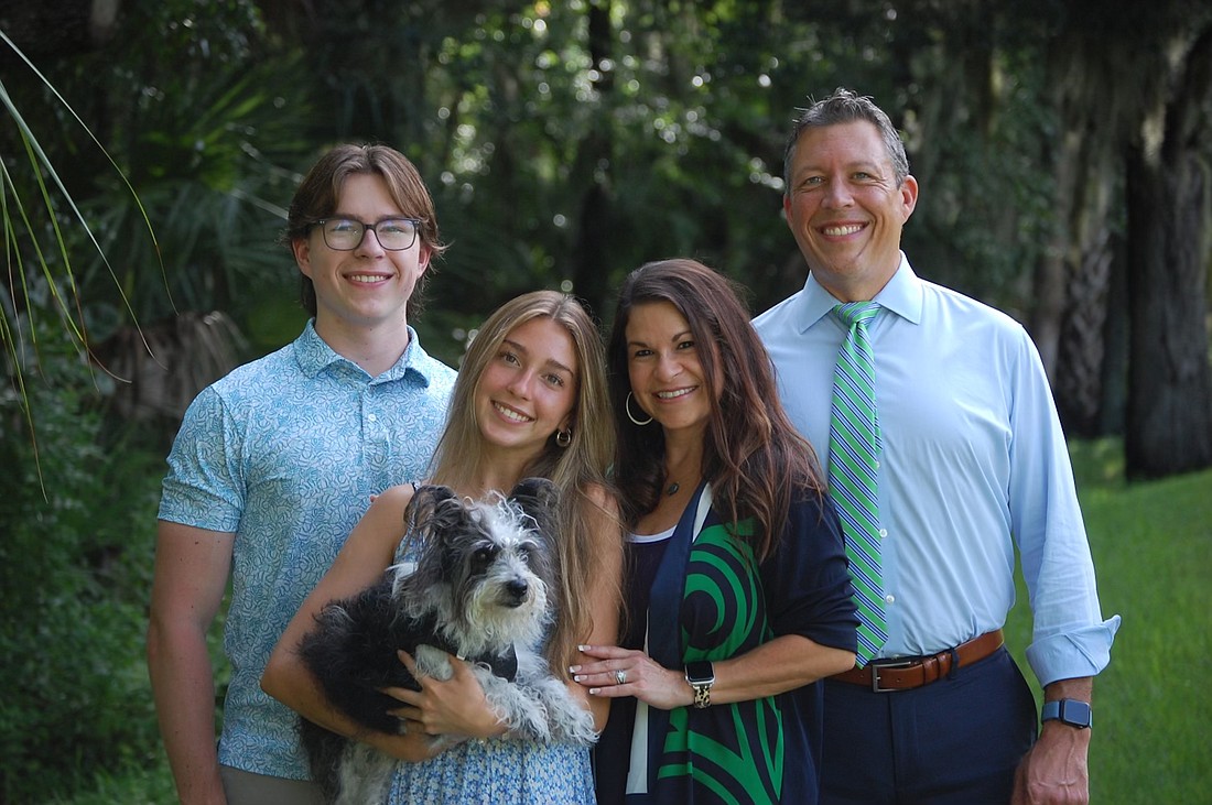 George Kruse is running for re-election in District 7. The Kruse family from left to right: Alexander, Olivia, Jessica and George.