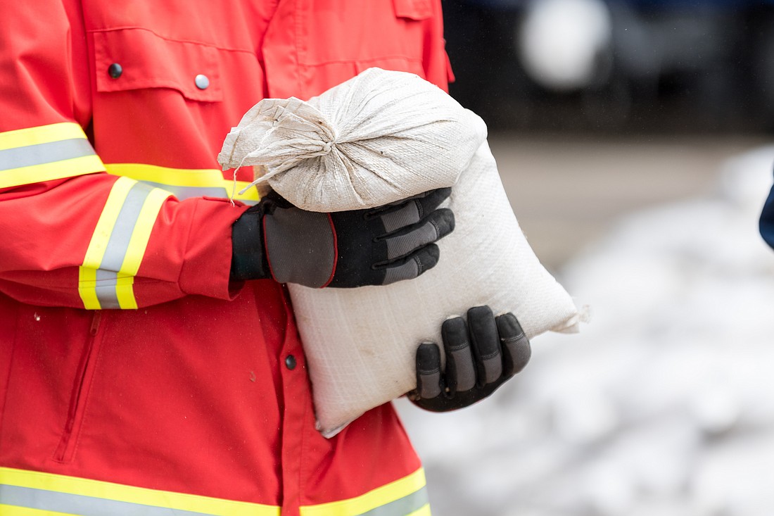 Sandbags are commonly used during floods, because they are an inexpensive and effective way to prevent water from entering a building.