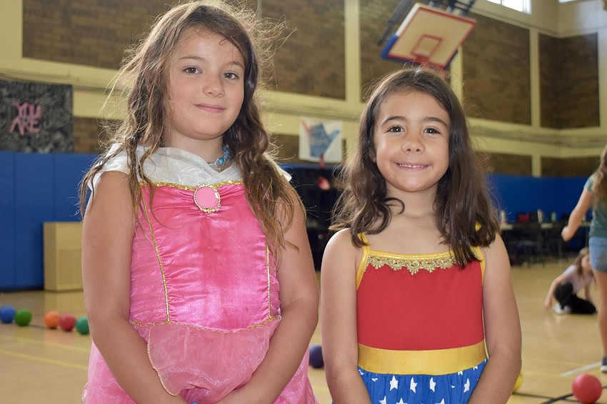 Sloan Hernandez, 7, came dressed as Aurora and Yael Daniel, 7, came dressed as Wonder Woman.
